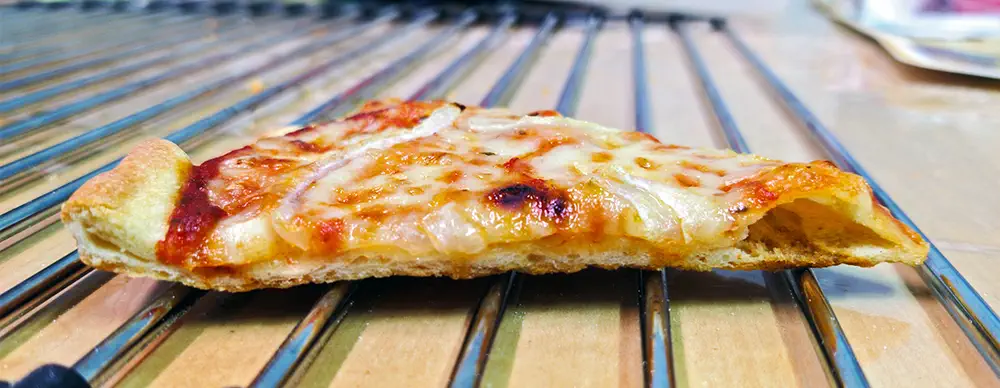 A slice of a cracker-style pizza